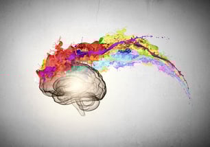Conceptual image of human brain in colorful splashes Conceptual image of human brain in colorful splashes