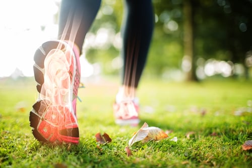 Digital composite of Highlighted foot bones of jogging woman-1 Digital composite of Highlighted foot bones of jogging woman-1