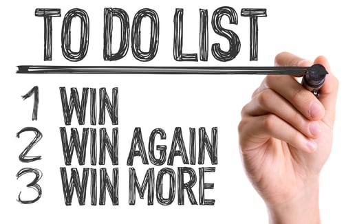Hand with marker writing the word To Do List WinWin AgainWin More-1
